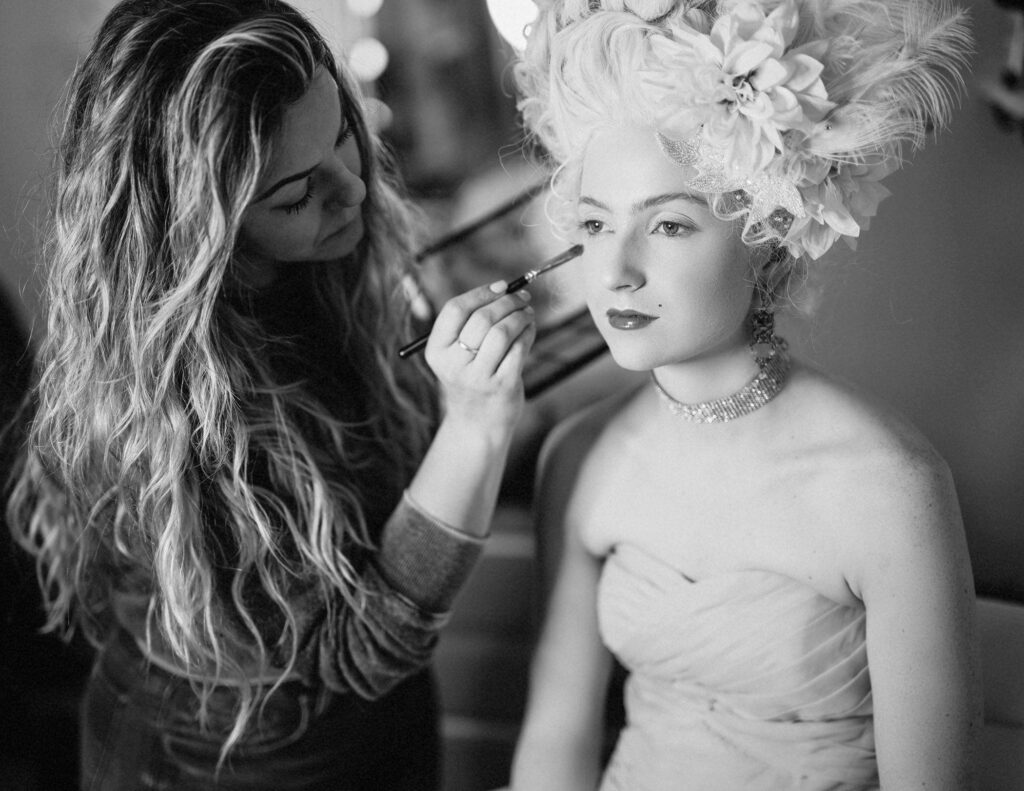 Brookfield, WI woman gets her hair and makeup done for a Marie Antoinette-inspired photoshoot.